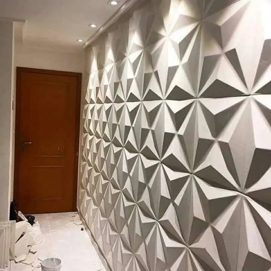 Sculptural geometric wall finish in a residential interior